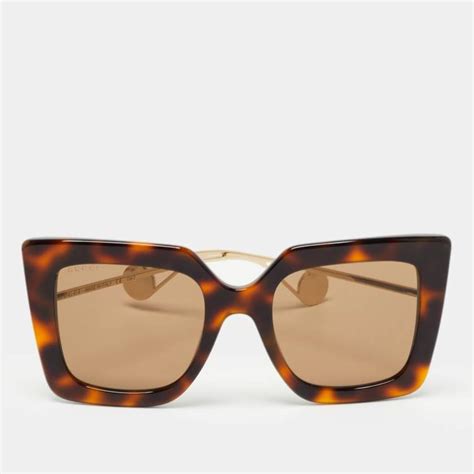 Gucci GG0435S Sunglasses .